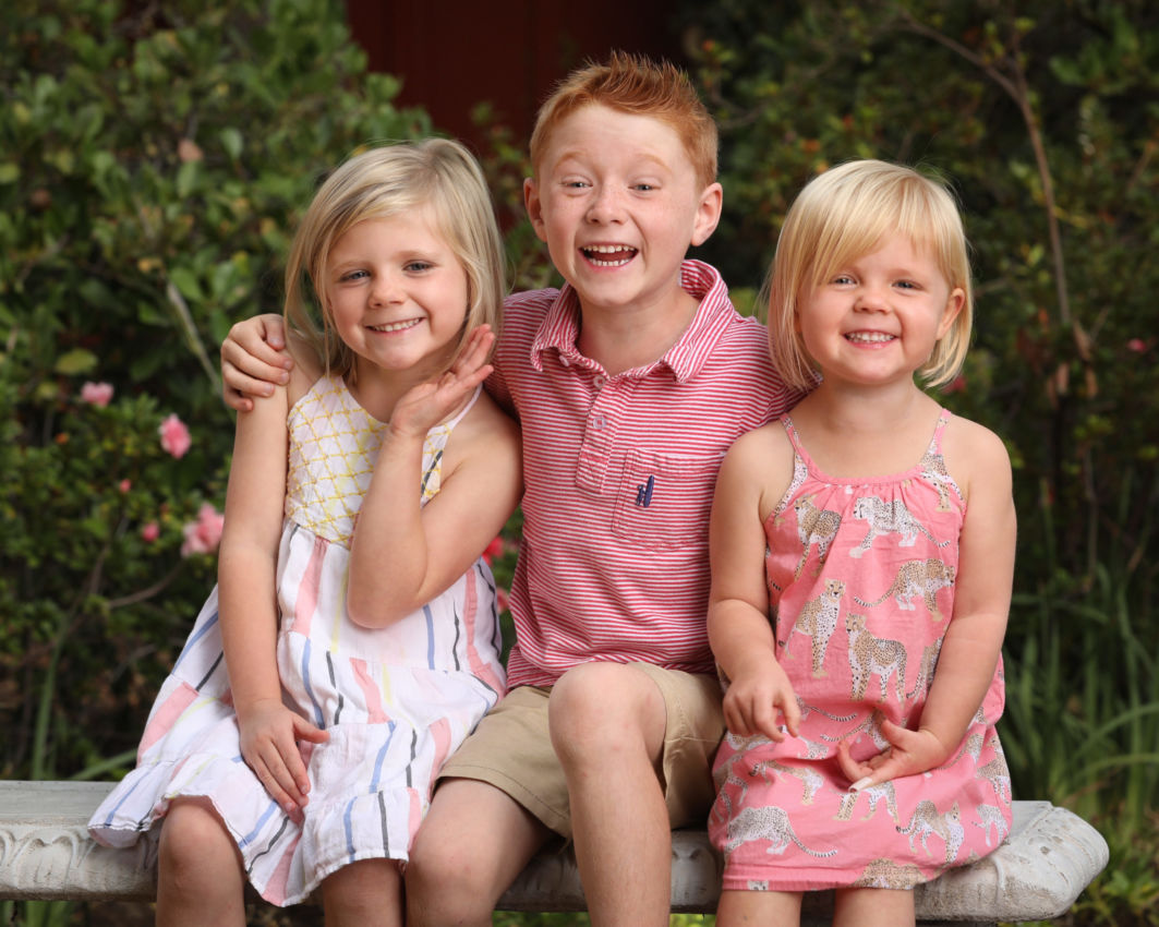 3 kids smiling